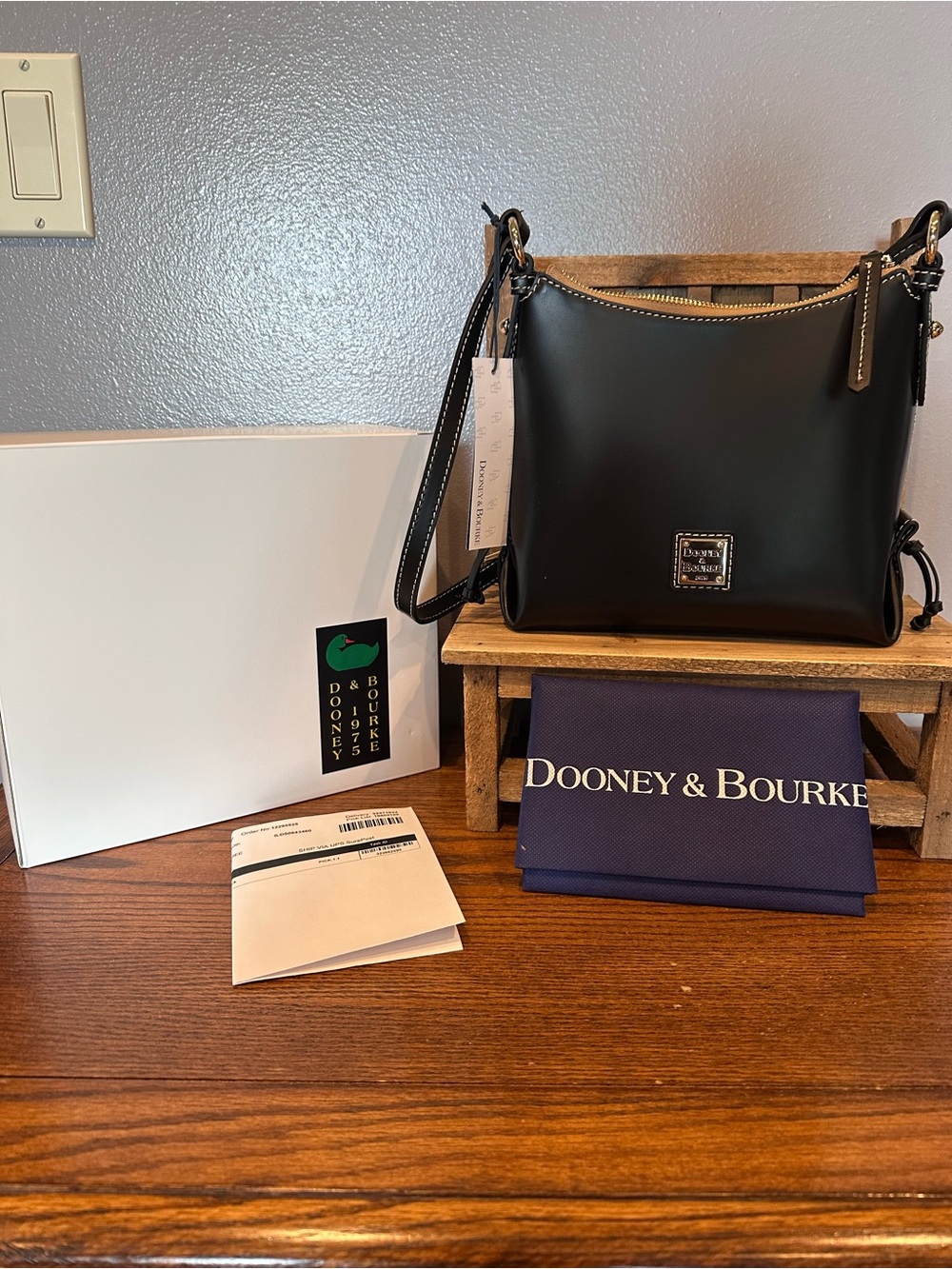 Dooney & Bourke Black North South Leather crossbody Bag with Gold Hardware